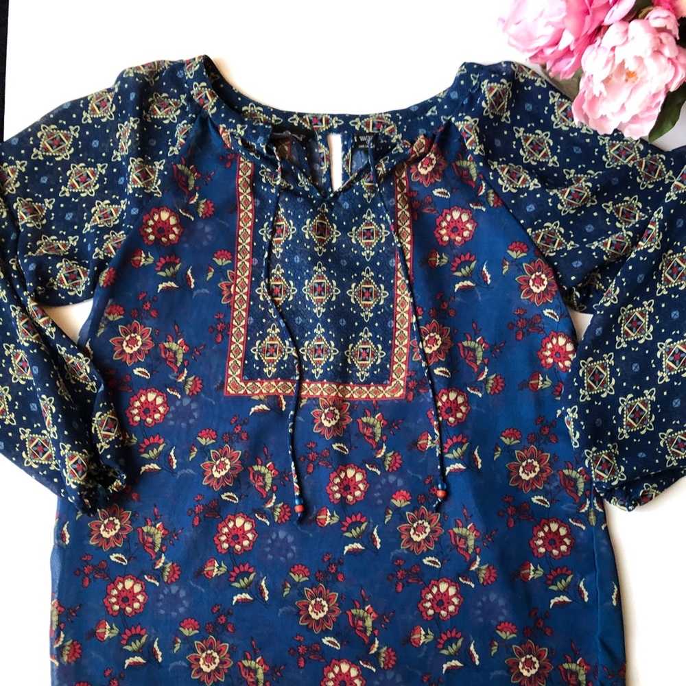 Angie blouse. 100% Polyester. New without tags.